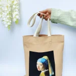 توت بگ طرح دختری با گوشواره مروارید اثر یوهانس ورمیر